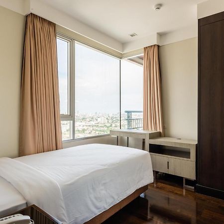 Jasmine Grande Residence Bangkok Exterior photo A bedroom in a serviced apartment in Cairo, Egypt