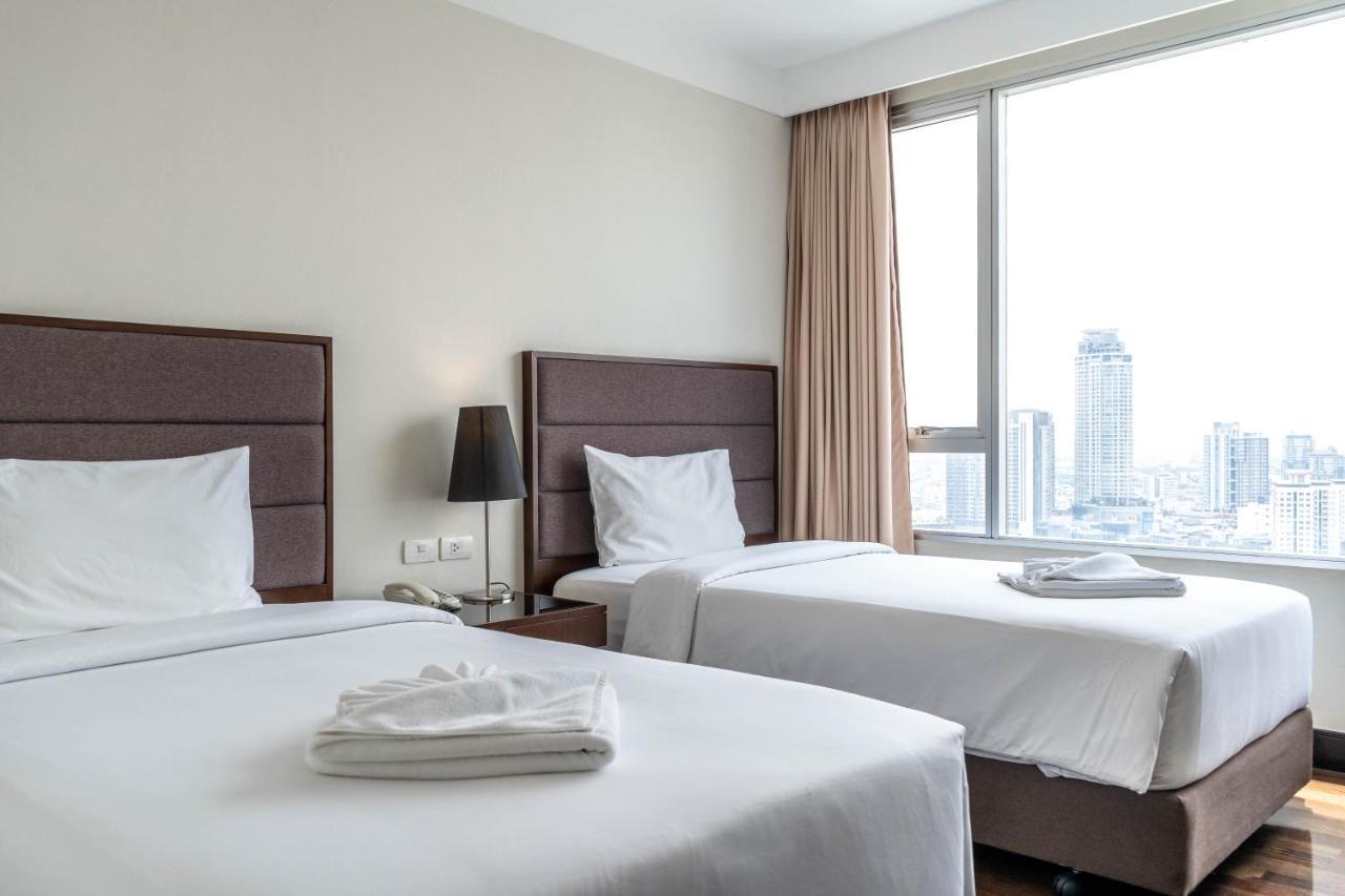 Jasmine Grande Residence Bangkok Exterior photo A bedroom at the hotel